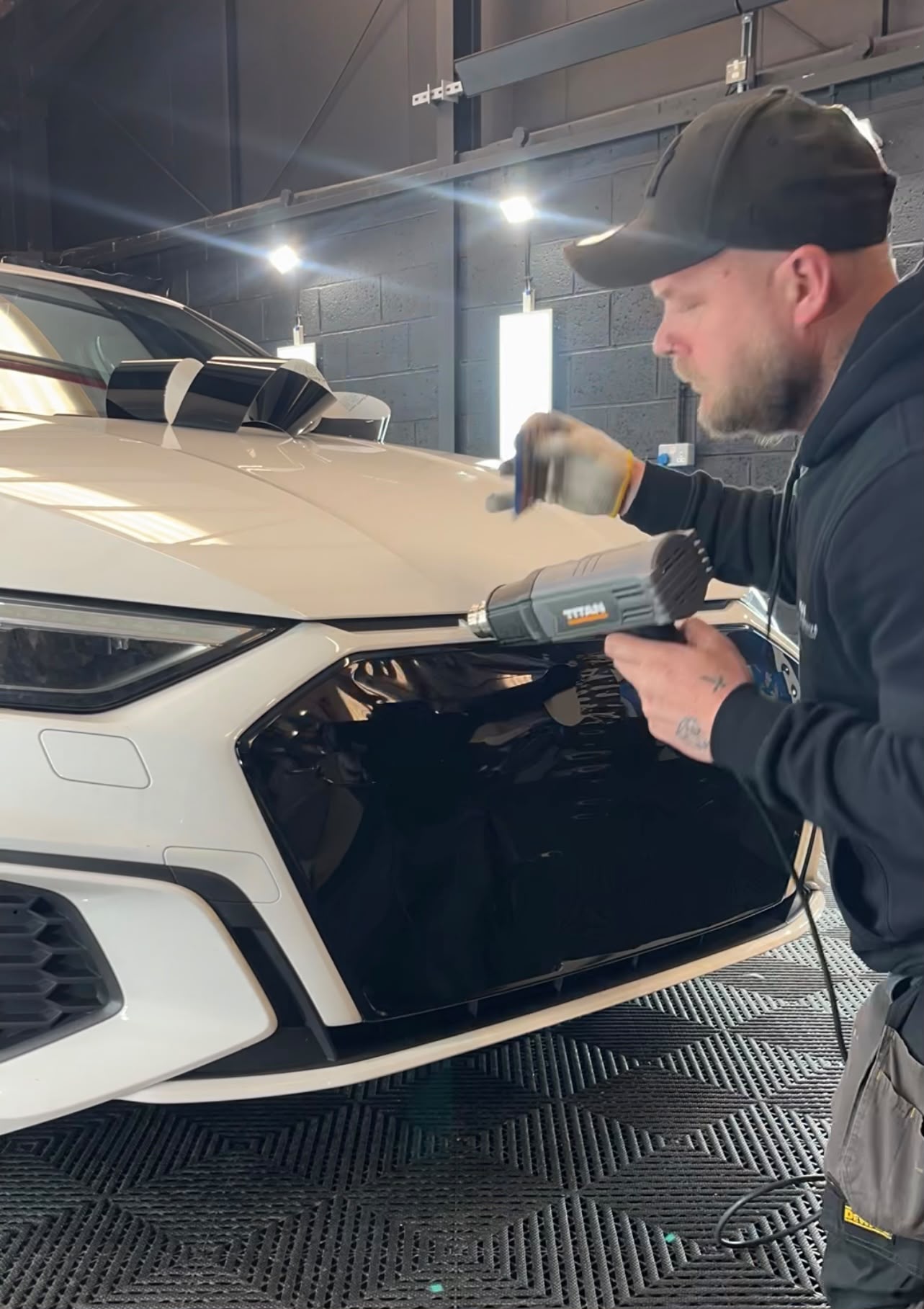 Richard Russell working on a vehicle at T&W Automotive